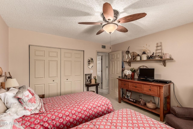 16249 E Stancrest Dr, Fountain Hills, AZ 85268 - carpeted bedroom with a closet, a textured ceiling, and ceiling fan