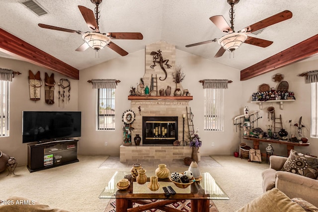 16249 E Stancrest Dr, Fountain Hills, AZ 85268 - living area with ceiling fan, carpet flooring, a fireplace, lofted ceiling, and a textured ceiling