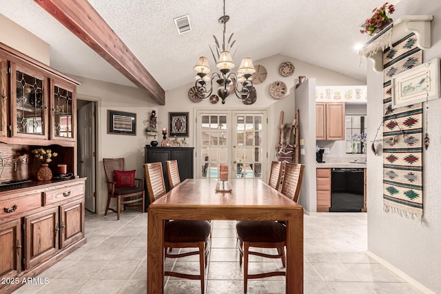 16249 E Stancrest Dr, Fountain Hills, AZ 85268 - dining space with a chandelier, lofted ceiling, light tile patterned floors, a textured ceiling, and french doors