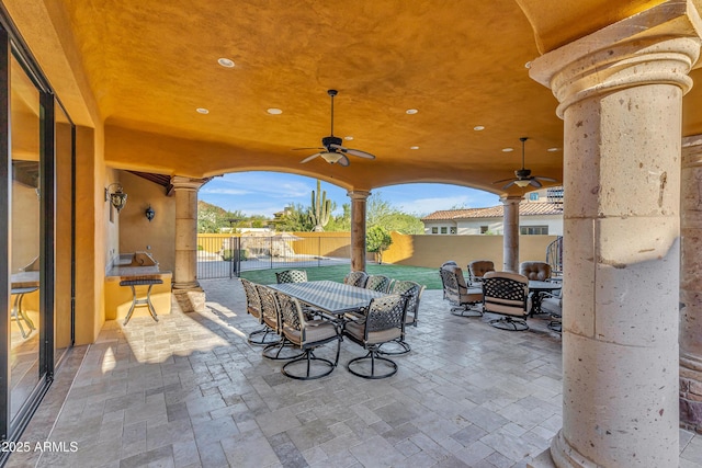 view of patio with ceiling fan