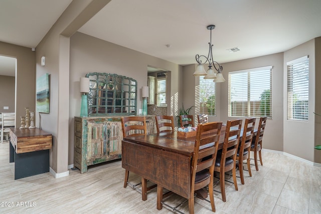 dining area with visible vents and baseboards