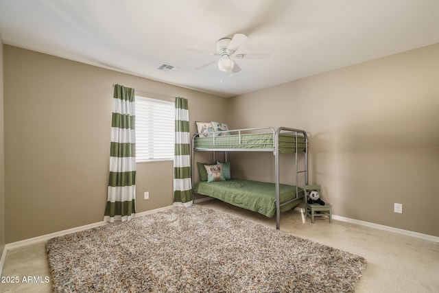 bedroom featuring visible vents, ceiling fan, and baseboards