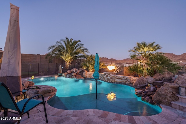 view of pool featuring fence and a fenced in pool