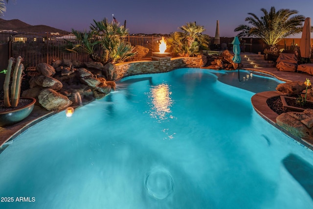 view of pool featuring a fenced in pool and a fenced backyard