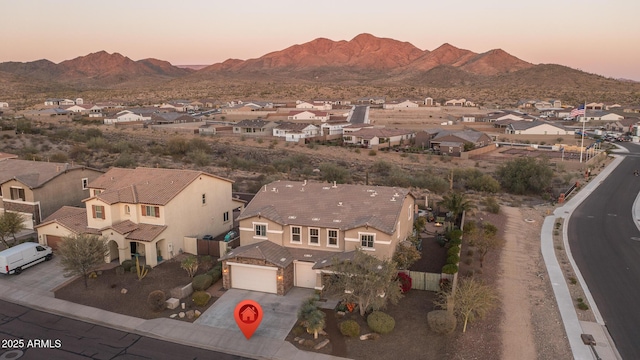 bird's eye view with a residential view and a mountain view