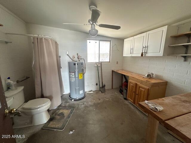 513 S Cardinal Dr, Apache Junction, AZ 85120 - below grade area featuring electric water heater, ceiling fan, and concrete block wall