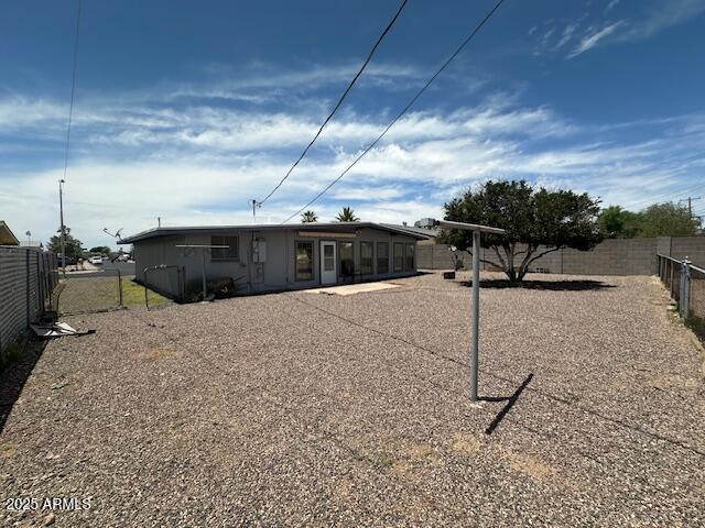 513 S Cardinal Dr, Apache Junction, AZ 85120 - back of house featuring a fenced backyard