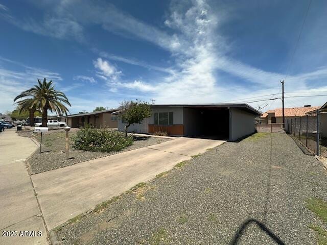 513 S Cardinal Dr, Apache Junction, AZ 85120 - single story home featuring driveway and a carport