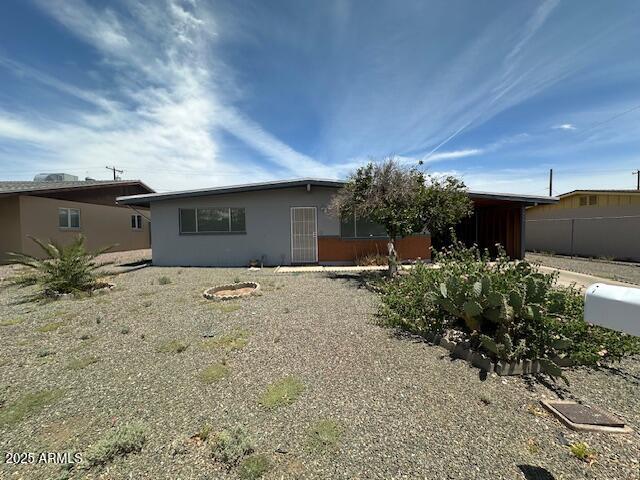 513 S Cardinal Dr, Apache Junction, AZ 85120 - view of front of home featuring stucco siding