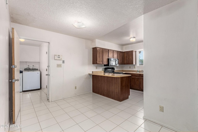 7849 E Golf Ave, Mesa, AZ 85209 - kitchen with washer / clothes dryer, black electric range, a peninsula, light countertops, and a sink