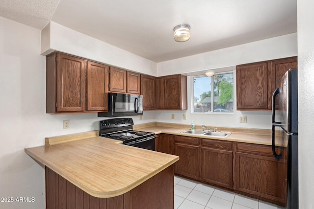 7849 E Golf Ave, Mesa, AZ 85209 - kitchen with black appliances, a sink, a peninsula, light countertops, and light tile patterned floors