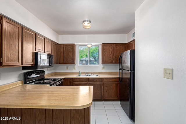 7849 E Golf Ave, Mesa, AZ 85209 - kitchen with black appliances, a sink, light countertops, a peninsula, and light tile patterned floors