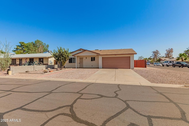 7849 E Golf Ave, Mesa, AZ 85209 - ranch-style house featuring an attached garage, driveway, and stucco siding