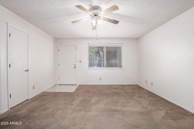 7849 E Golf Ave, Mesa, AZ 85209 - unfurnished room with carpet, ceiling fan, and a textured ceiling