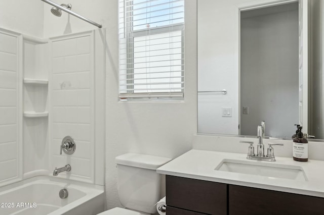 bathroom with a wealth of natural light, toilet, shower / bath combination, and vanity