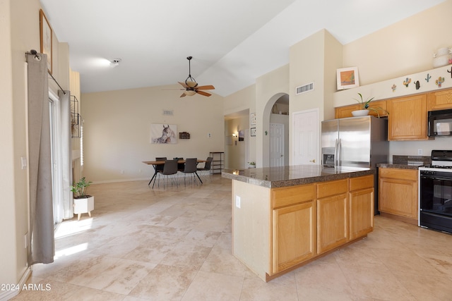 kitchen with a center island, high vaulted ceiling, stainless steel refrigerator with ice dispenser, ceiling fan, and range