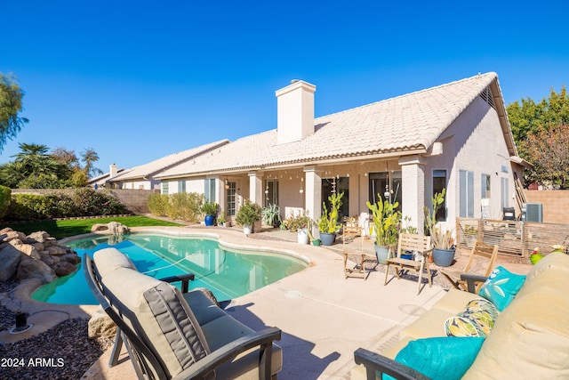 view of pool featuring a patio area