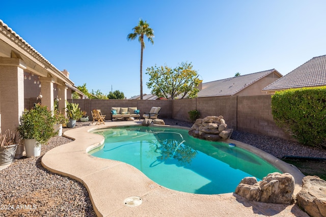 view of swimming pool featuring outdoor lounge area