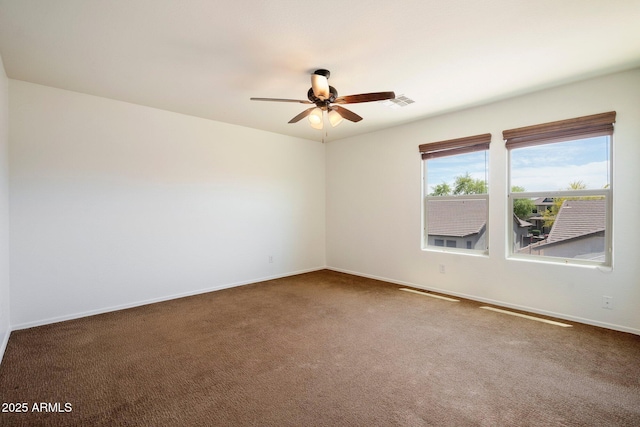 12217 W Planada Ln, Sun City, AZ 85373 - carpeted empty room featuring visible vents, ceiling fan, and baseboards