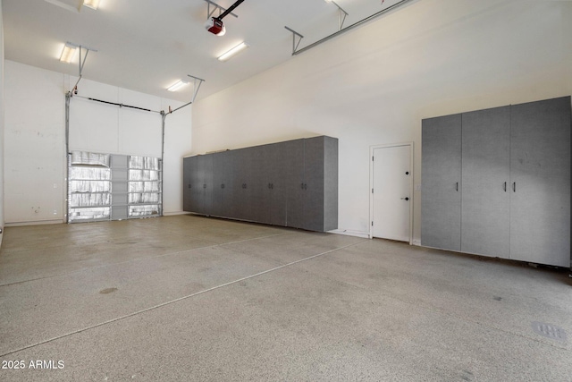 12217 W Planada Ln, Sun City, AZ 85373 - garage featuring a garage door opener