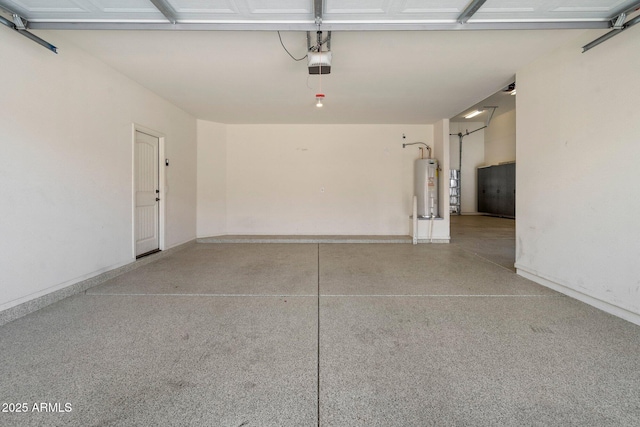 12217 W Planada Ln, Sun City, AZ 85373 - garage with a garage door opener, water heater, and baseboards