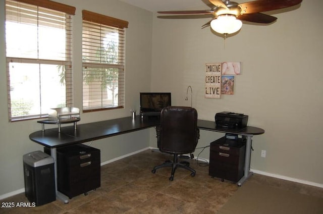 12217 W Planada Ln, Sun City, AZ 85373 - home office featuring a ceiling fan and baseboards