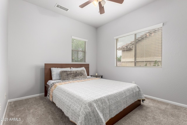 bedroom featuring carpet flooring, baseboards, and ceiling fan