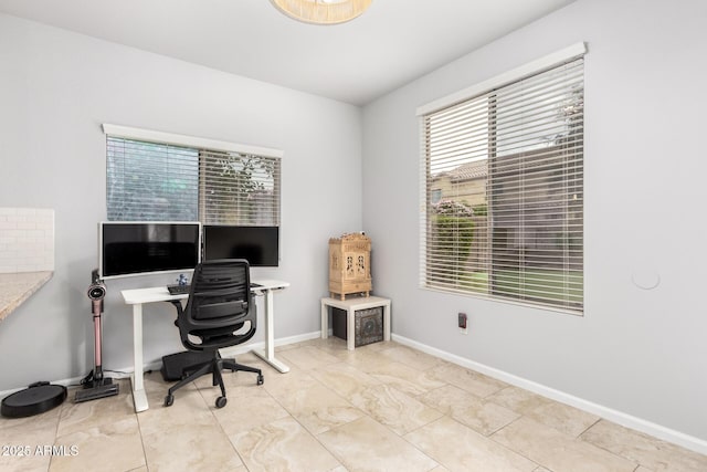 office area featuring baseboards