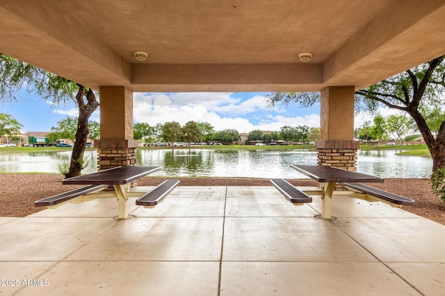 view of patio / terrace with a water view
