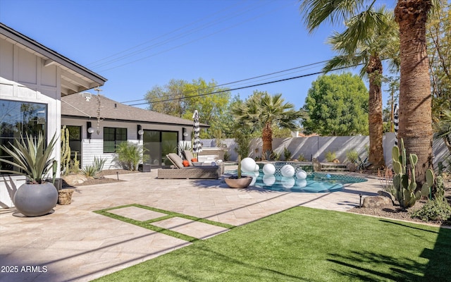 view of patio featuring a fenced backyard and a fenced in pool