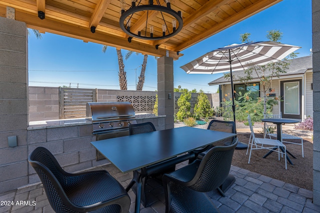 view of patio / terrace with a grill and an outdoor kitchen