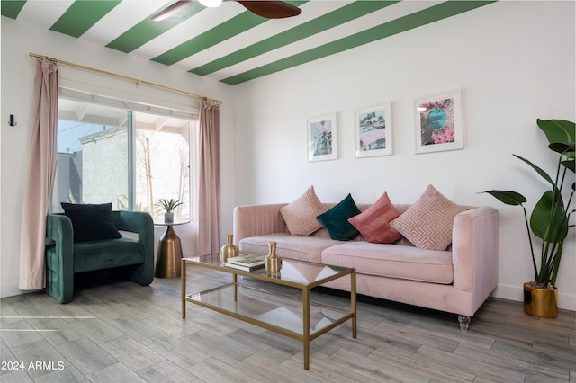 living room featuring ceiling fan and light wood-type flooring