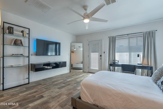 bedroom featuring ceiling fan and hardwood / wood-style flooring