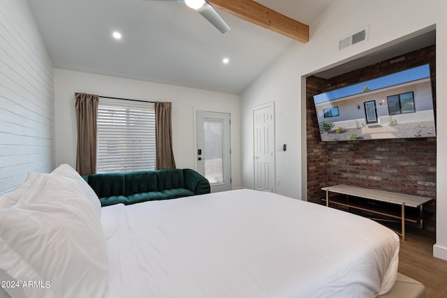 bedroom featuring ceiling fan, hardwood / wood-style flooring, and vaulted ceiling with beams