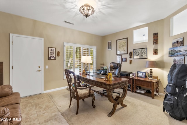 office space with light tile patterned flooring