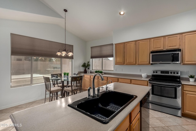 kitchen with an inviting chandelier, stainless steel appliances, hanging light fixtures, vaulted ceiling, and sink