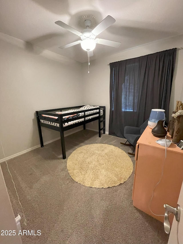 bedroom with baseboards, a ceiling fan, and carpet floors