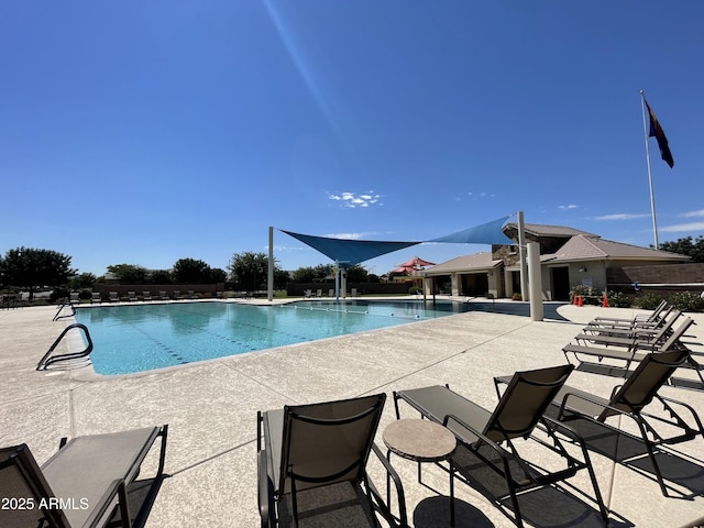 community pool featuring a patio area