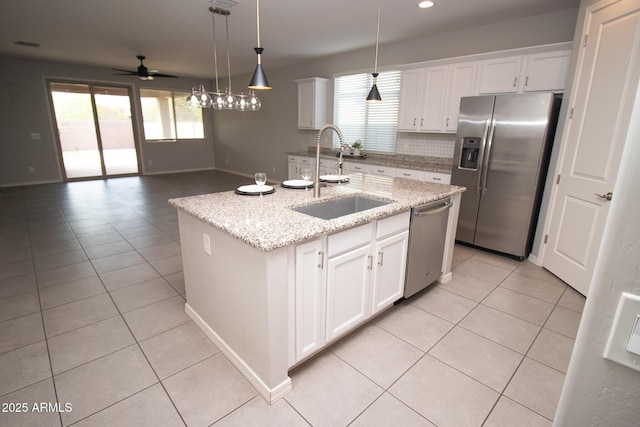 20471 E Carriage Way, Queen Creek, AZ 85142 - kitchen with stainless steel appliances, a sink, light tile patterned floors, ceiling fan, and recessed lighting