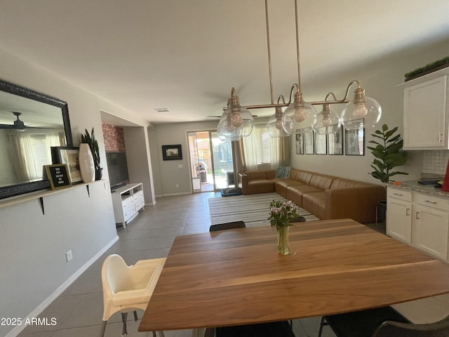 20471 E Carriage Way, Queen Creek, AZ 85142 - tiled dining area with baseboards