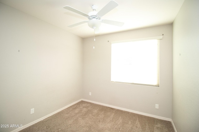 20471 E Carriage Way, Queen Creek, AZ 85142 - empty room featuring carpet floors, healthy amount of natural light, and baseboards