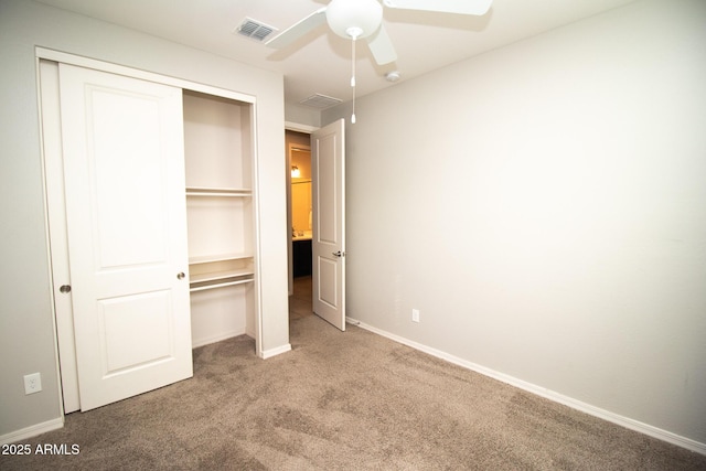 20471 E Carriage Way, Queen Creek, AZ 85142 - unfurnished bedroom with carpet, a closet, baseboards, and a ceiling fan