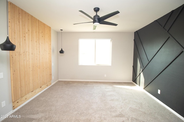 20471 E Carriage Way, Queen Creek, AZ 85142 - carpeted spare room featuring a ceiling fan, wooden walls, and baseboards