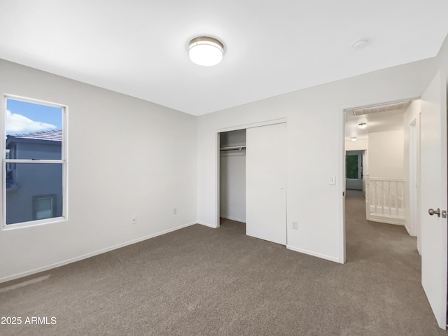 4229 E Betsy Ln, Gilbert, AZ 85296 - unfurnished bedroom featuring carpet flooring and a closet