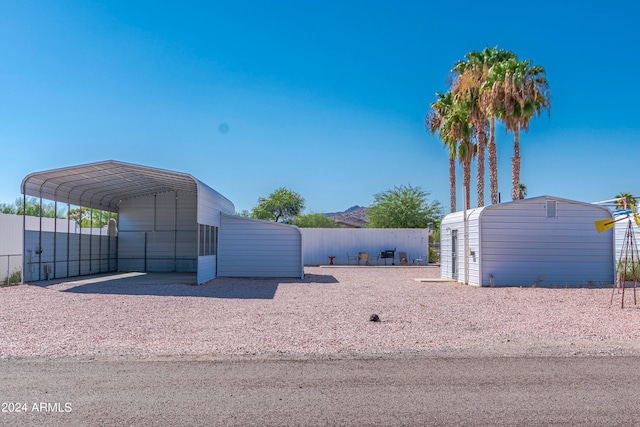 view of yard with a carport