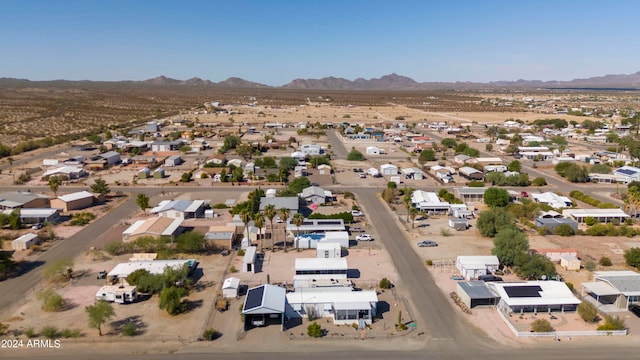 drone / aerial view featuring a mountain view