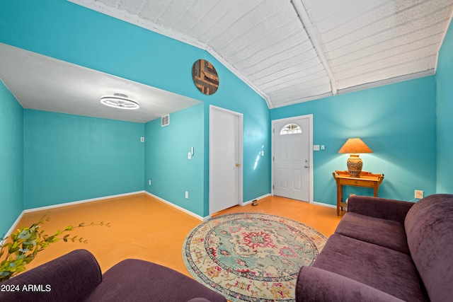 living room with vaulted ceiling