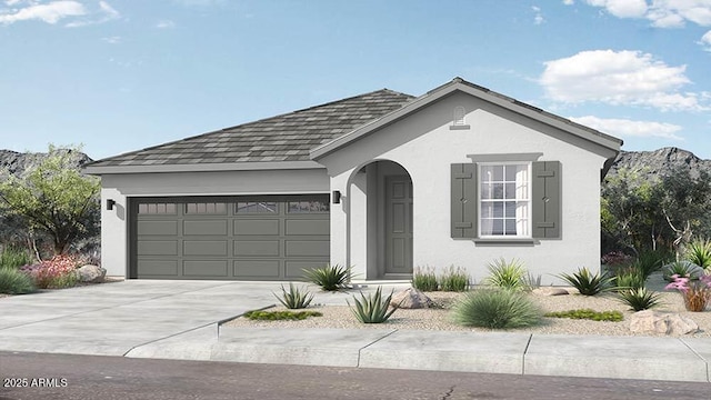 14403 W Sand Hills Rd, Surprise, AZ 85387 - view of front of home with stucco siding, driveway, and a garage
