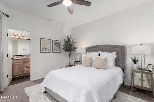 bedroom featuring carpet, connected bathroom, and ceiling fan