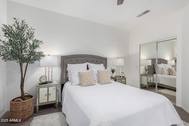 bedroom featuring ceiling fan and a closet